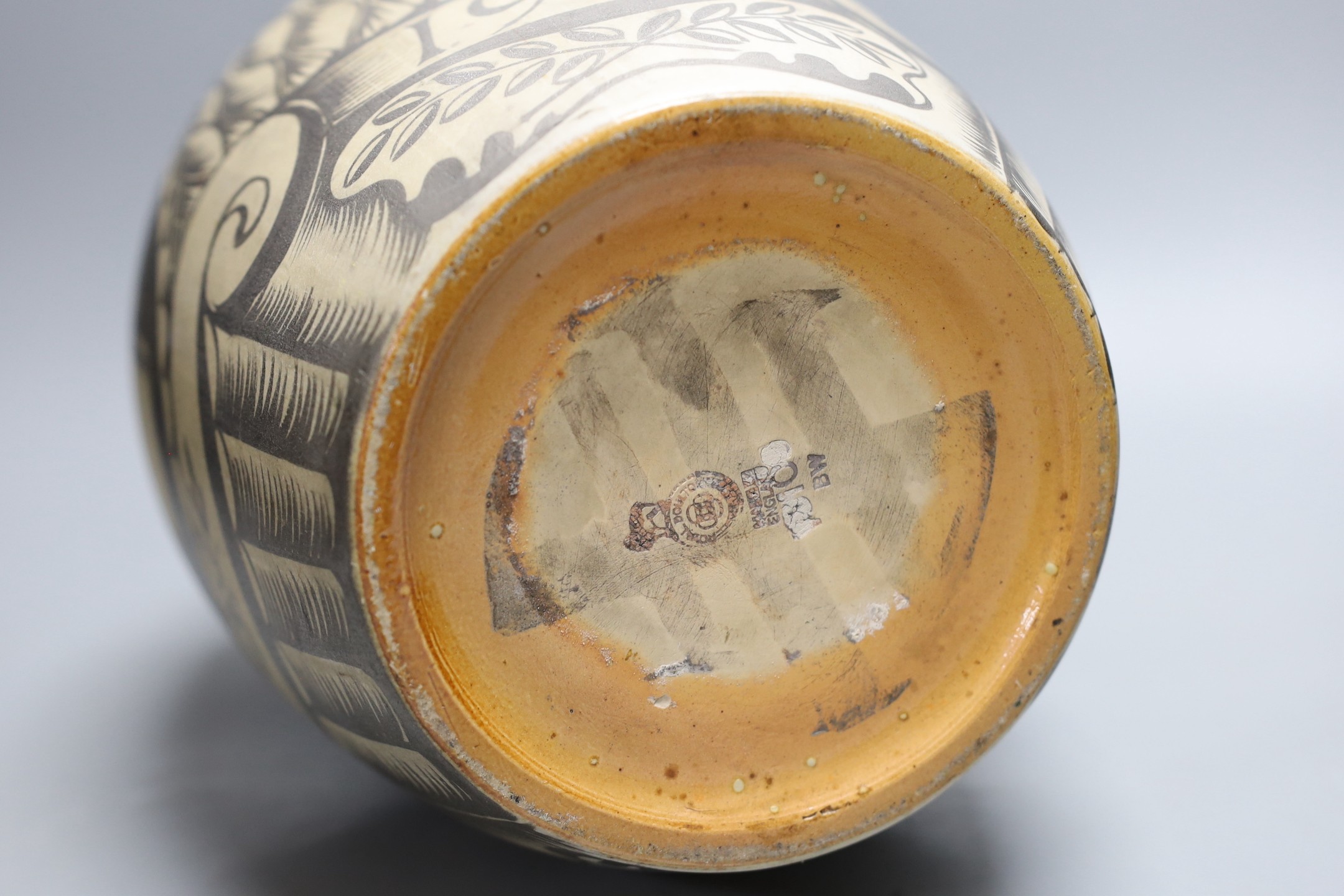 A possibly unique Royal Doulton Lambeth stoneware silver lustre vase, c.1936, painted with Greek style heads on a feather ground, inscribed ‘A*E*B 1936’, impressed marks to base, 30.5 cm high